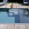 Volet roulant piscine avec caillebotis immergé